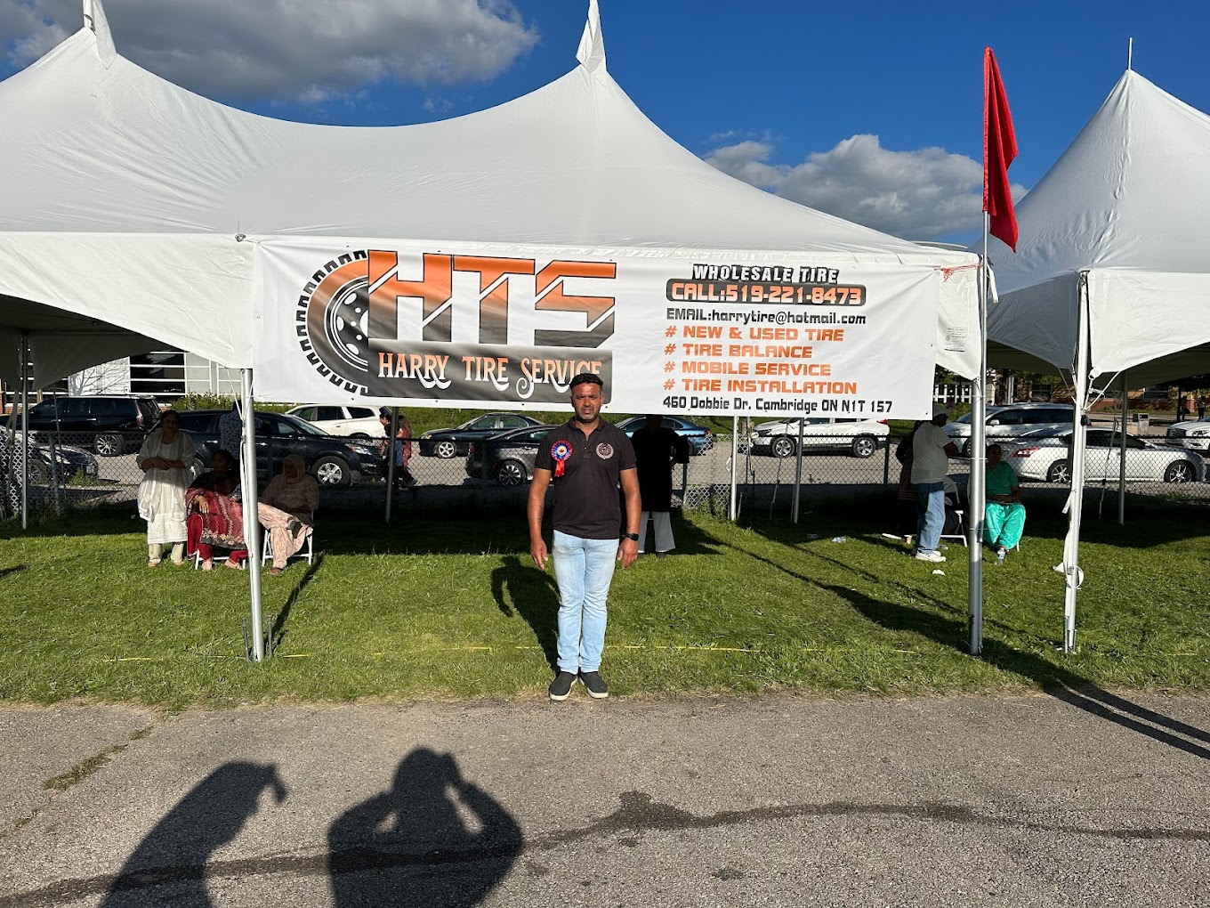 Harry Tire Service owner at community event